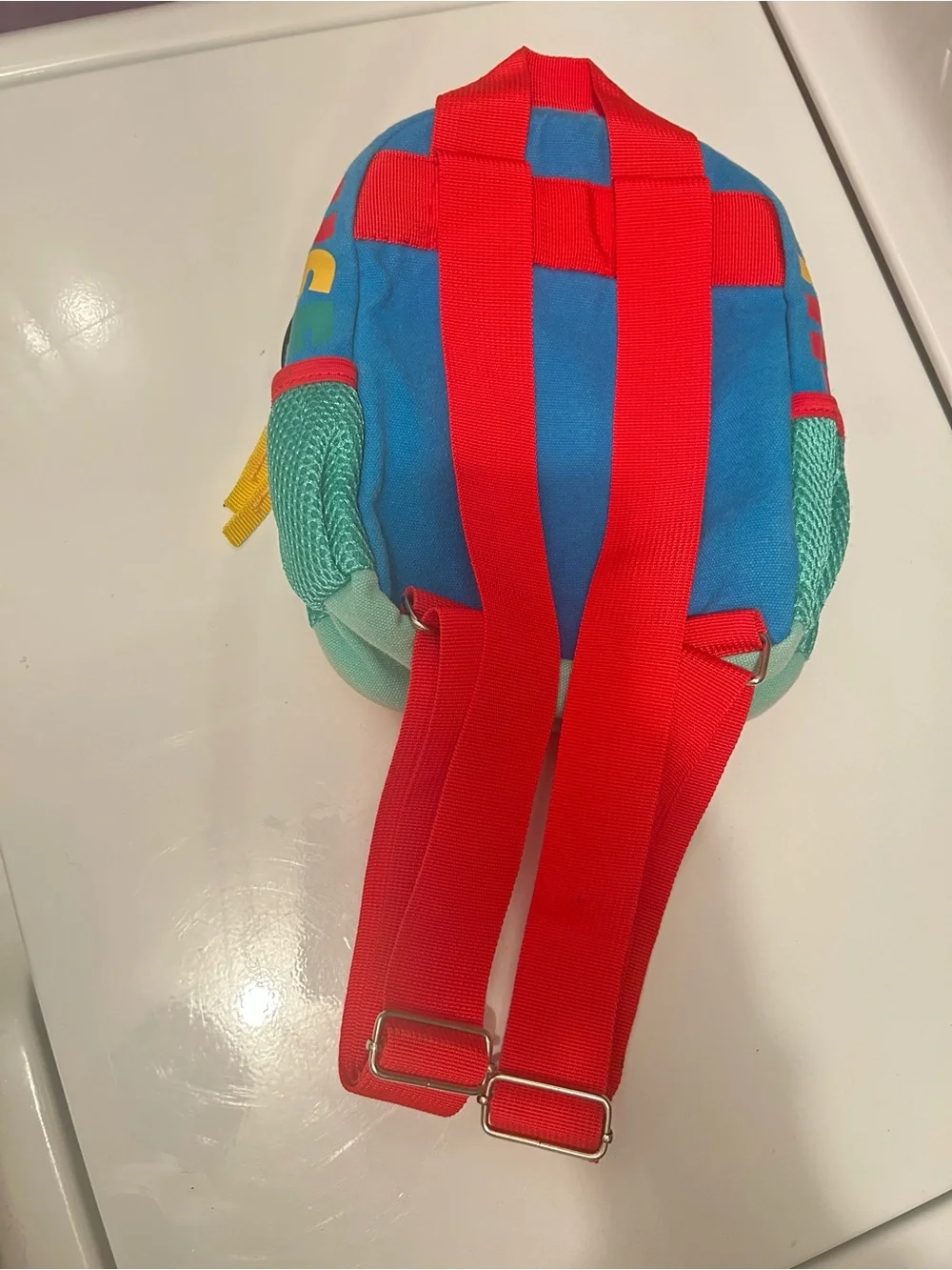 Disney Red Mickey Mouse Kids Backpack with Teal Pockets and Yellow Trim